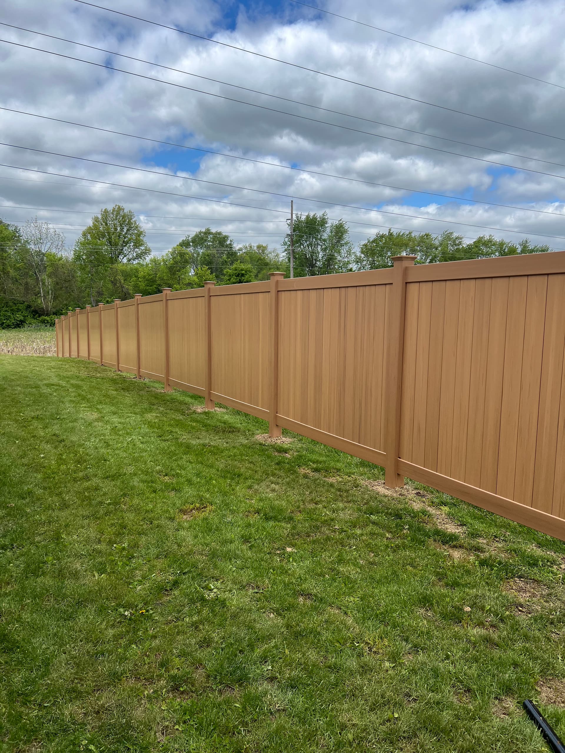 Gallery photos for Cyprus Wood Grain Vinyl Privacy Fence Install in Shawnee: Image #3