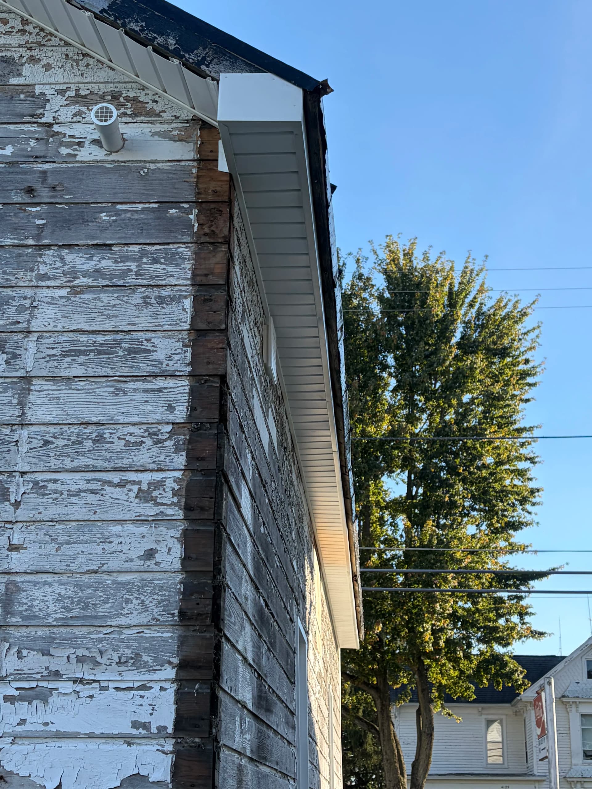 Gomer Barbershop Gets Fresh Vinyl Siding and Custom Trim