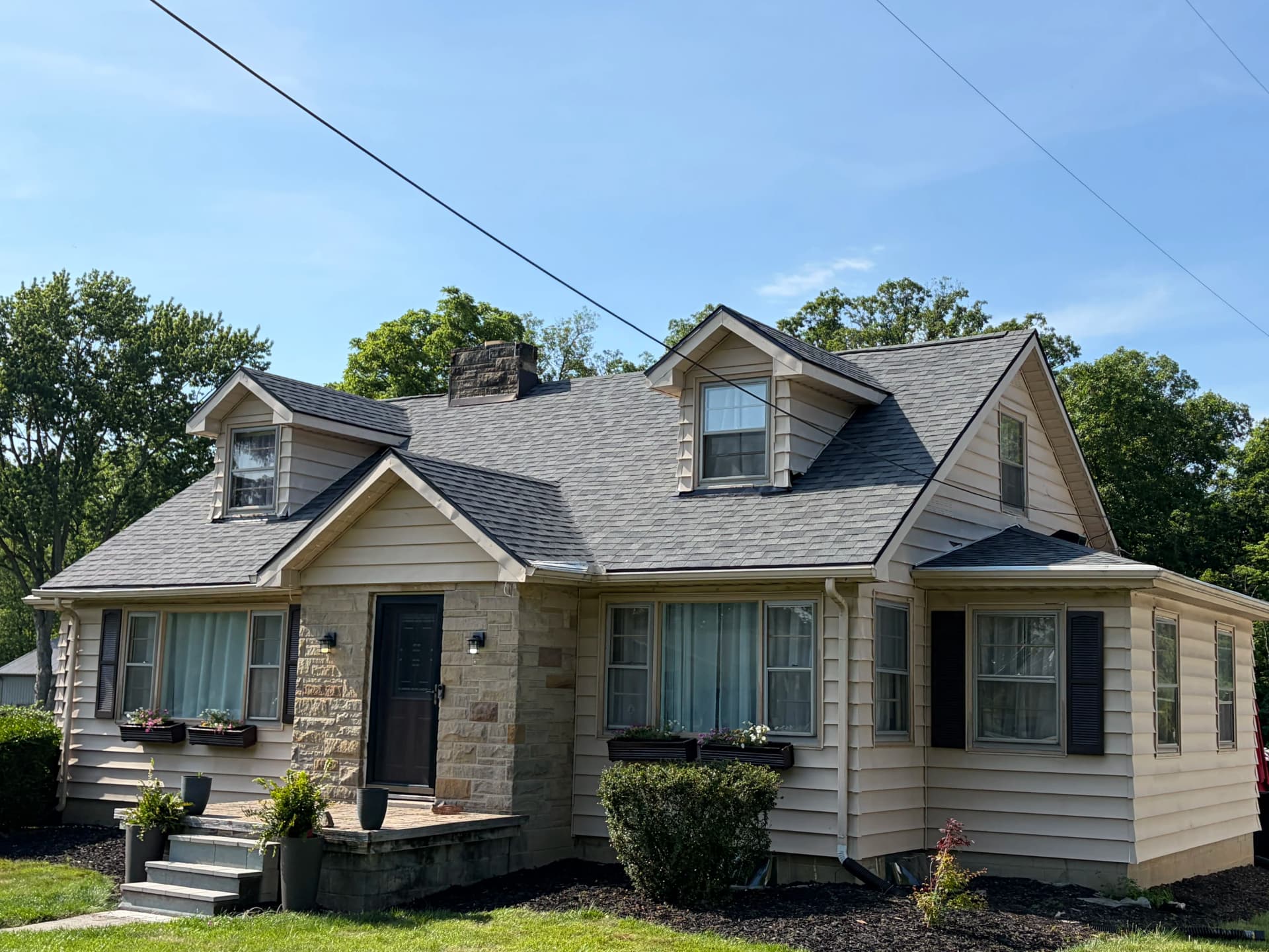 Full Roof Replacement in Lima With Owens Corning Shingles and Rolled Roofing