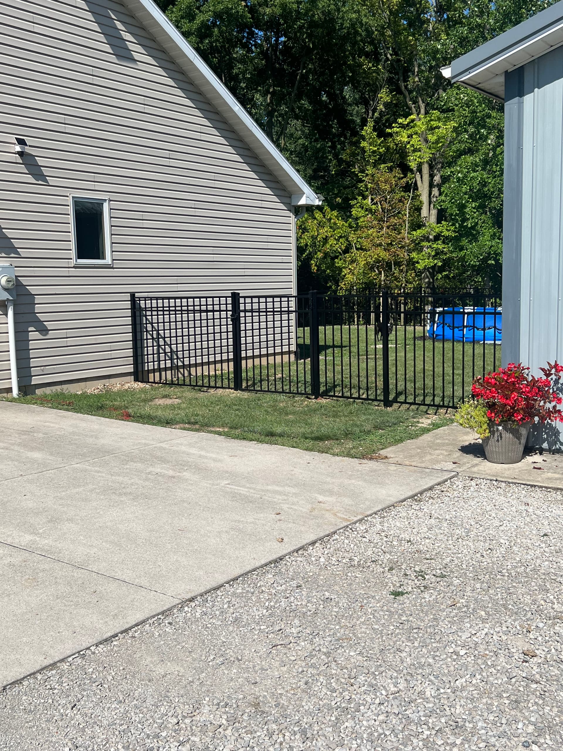 4-Foot Black Aluminum Fence That Keeps Dogs In and Views Open