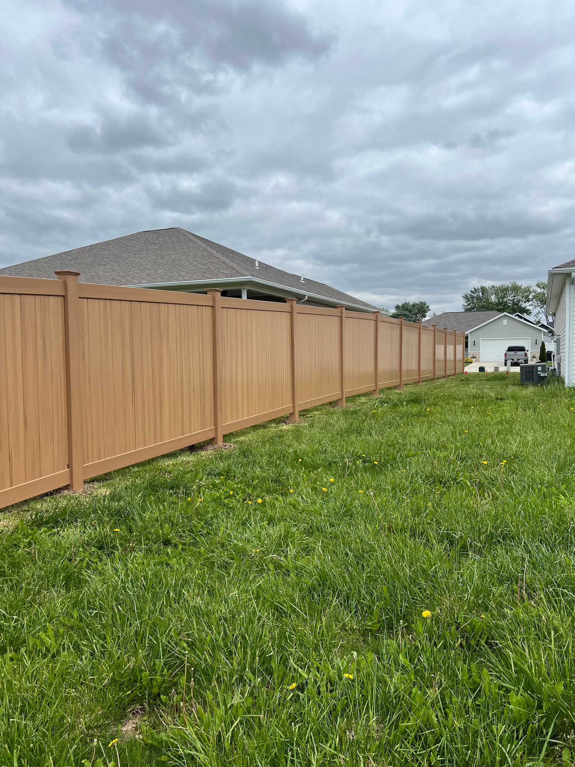 Gallery photos for Cyprus Wood Grain Vinyl Privacy Fence Install in Shawnee: Image #2