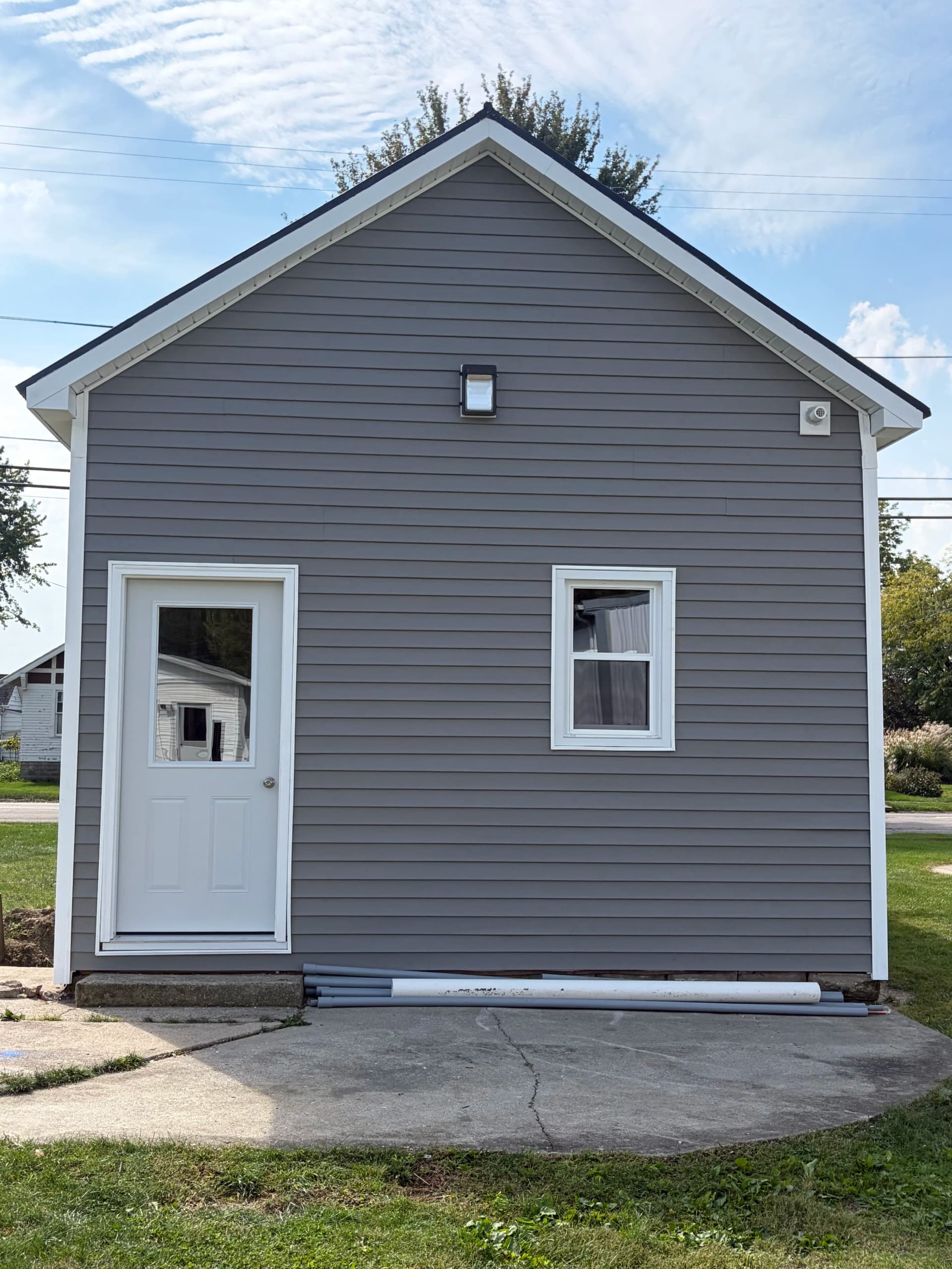 Gallery photos for Gomer Barbershop Gets Fresh Vinyl Siding and Custom Trim: Image #7