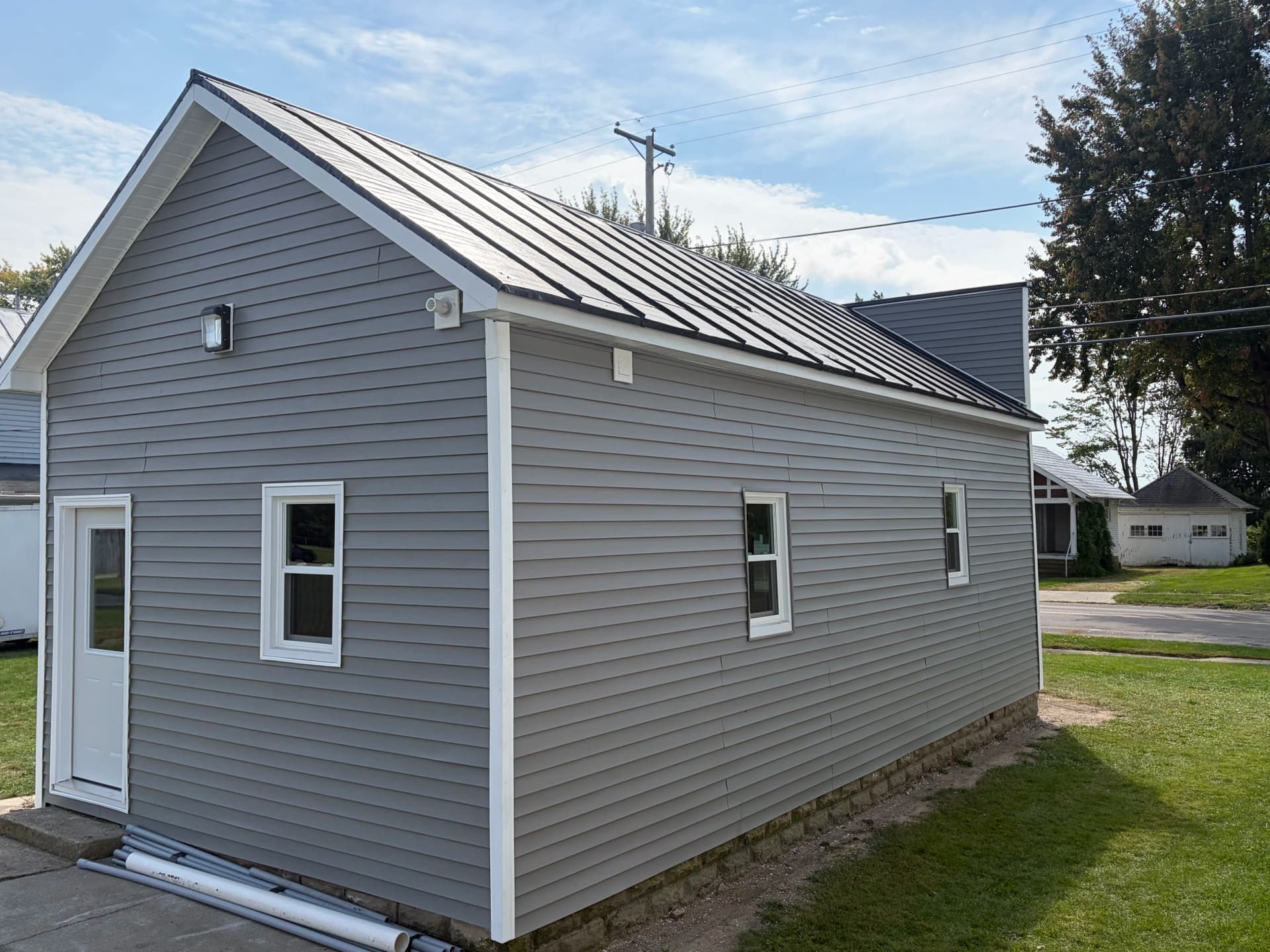 Gallery photos for Gomer Barbershop Gets Fresh Vinyl Siding and Custom Trim: Image #8