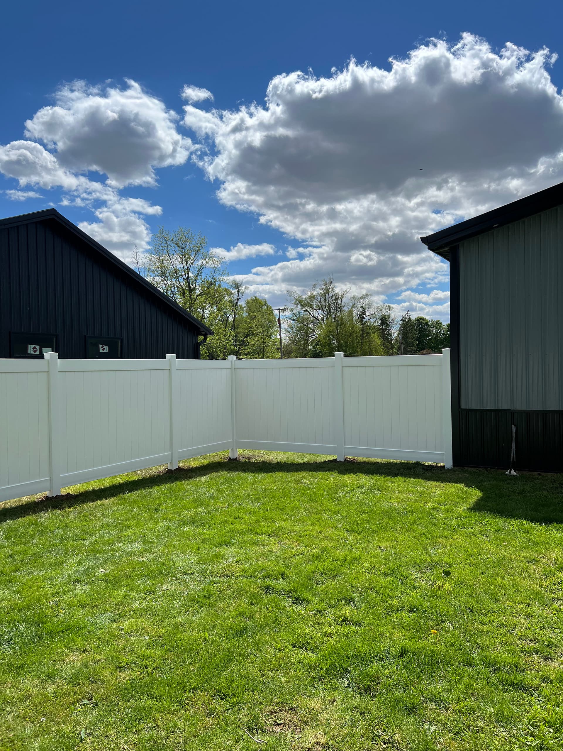 Clean White Vinyl Privacy Fence in Gomer Ohio image