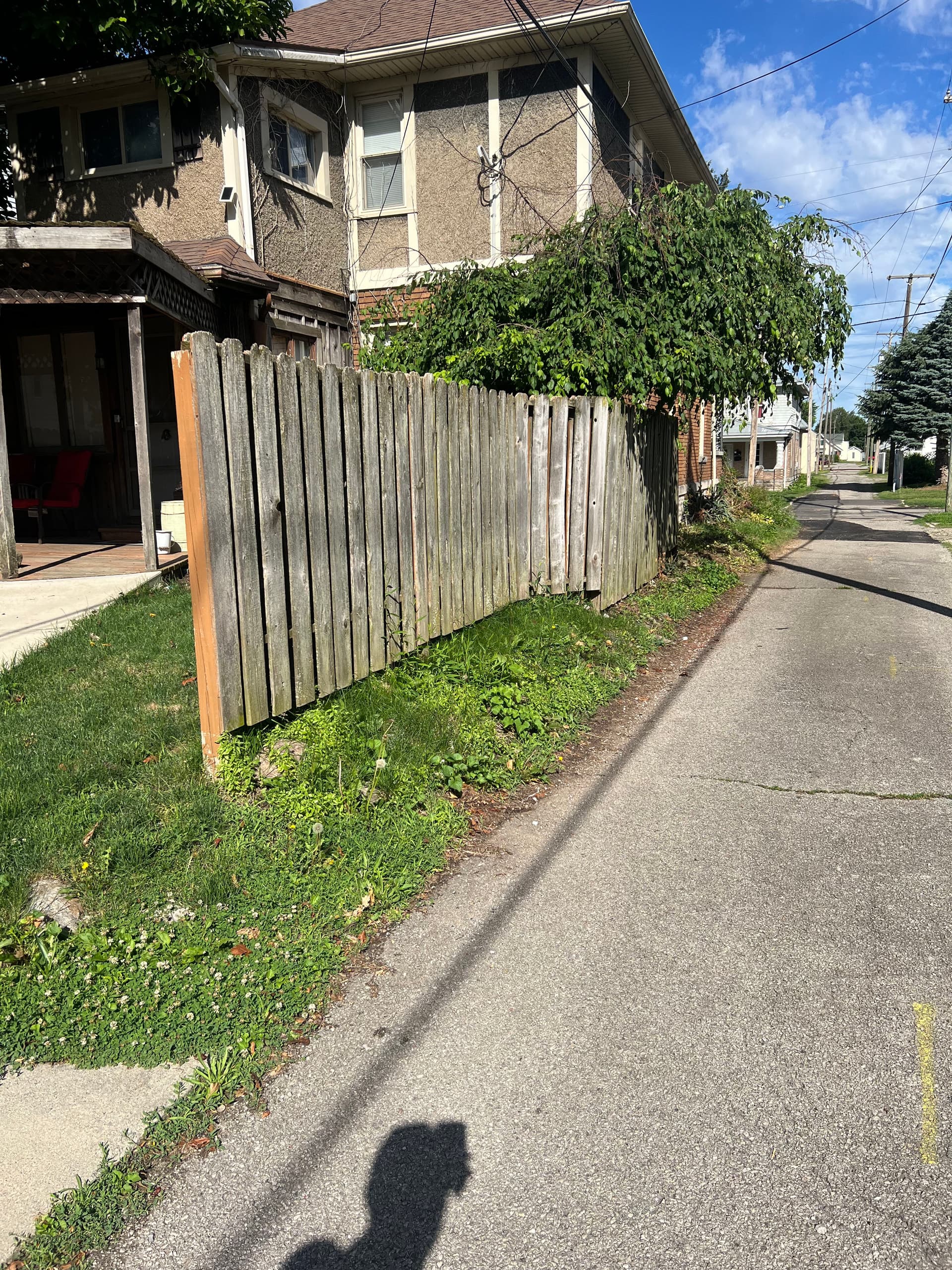 Old Wood Fence Out, New Vinyl Privacy Fence In Van Wert image